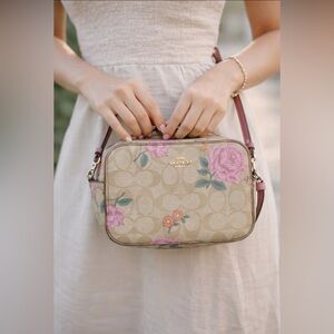 Coach Floral Signature Canvas Crossbody in Beige and Pink